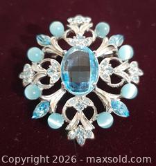 MaxSold Auction: Vintage silver tone blue crystal Butler brooch.  Signed - View Royal (British Columbia, Canada) SELLER MANAGED Downsizing Online Auction - Pheasant Lane