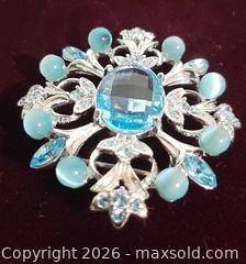 MaxSold Auction: Vintage silver tone blue crystal Butler brooch.  Signed - View Royal (British Columbia, Canada) SELLER MANAGED Downsizing Online Auction - Pheasant Lane