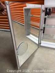 MaxSold Auction: Kohler / Wall-Mounted Aluminum Medicine Cabinet with Mirrored Doors - Washington (District of Columbia, USA) SELLER MANAGED Moving Online Auction - 15th Street Northeast