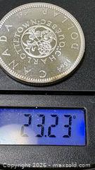 MaxSold Auction: 1964 CANADA Quebec Charlottetown Antique Vintage BIG SILVER Dollar Coin  - Toronto (Ontario, Canada) SELLER MANAGED Reseller Online Auction - Dartmoor Drive