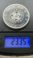 MaxSold Auction: 1964 Canadian Silver Dollar, a commemorative coin issued to mark the 100th anniversary  - Toronto (Ontario, Canada) SELLER MANAGED Reseller Online Auction - Dartmoor Drive