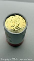 MaxSold Auction: 2026 $1 Collector's Edition Non-Circulation: Lucky Loonie - Special Wrap Roll - Toronto (Ontario, Canada) SELLER MANAGED Reseller Online Auction - Dartmoor Drive