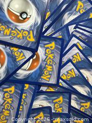 MaxSold Auction: About  25 Prandom Pokemoy cards - New Westminster (British Columbia, Canada) SELLER MANAGED Reseller Online Auction - Columbia Street
