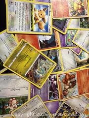 MaxSold Auction: About  25 Prandom Pokemoy cards - New Westminster (British Columbia, Canada) SELLER MANAGED Reseller Online Auction - Columbia Street