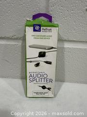 MaxSold Auction: Motorola earpiece with boom mic and ReTrak retractable audio splitter - New Westminster (British Columbia, Canada) SELLER MANAGED Reseller Online Auction - Columbia Street
