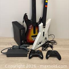 MaxSold Auction: Xbox 360 Console with 2 Guitar Hero Les Paul Guitars & Controllers - New Tecumseth (Ontario, Canada) SELLER MANAGED Downsizing Online Auction - Shephard Avenue