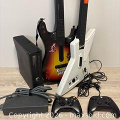 MaxSold Auction: Xbox 360 Console with 2 Guitar Hero Les Paul Guitars & Controllers - New Tecumseth (Ontario, Canada) SELLER MANAGED Downsizing Online Auction - Shephard Avenue