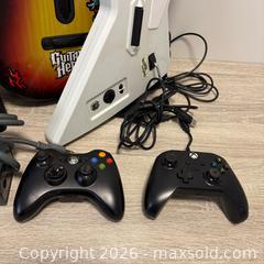 MaxSold Auction: Xbox 360 Console with 2 Guitar Hero Les Paul Guitars & Controllers - New Tecumseth (Ontario, Canada) SELLER MANAGED Downsizing Online Auction - Shephard Avenue