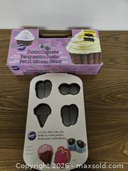 MaxSold Auction: Fun Cake & Cookie Pans - Brampton (Ontario, Canada) SELLER MANAGED Downsizing Online Auction - Nevada Court