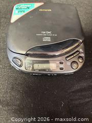 MaxSold Auction: Aiwa XP-33 Portable CD Player (Discman) - Black - Cobourg (Ontario, Canada) SELLER MANAGED Estate Sale Online Auction -  King Street East