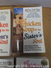 MaxSold Auction: 4 books  - Springwater (Ontario, Canada) SELLER MANAGED Downsizing Online Auction - Queen Street West