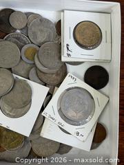 MaxSold Auction: Box of World Coins - Hamilton (Ontario, Canada) SELLER MANAGED Estate Sale Online Auction - Gertrude Street