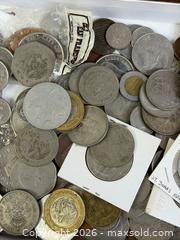 MaxSold Auction: Box of World Coins - Hamilton (Ontario, Canada) SELLER MANAGED Estate Sale Online Auction - Gertrude Street