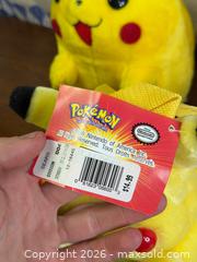 MaxSold Auction: Vintage 90s Pokemon Nintendo Pikachu Backpack + TOMY - Hamilton (Ontario, Canada) SELLER MANAGED Estate Sale Online Auction - Gertrude Street