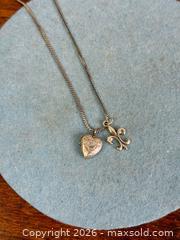 MaxSold Auction: Vintage Sterling Silver Ornate Heart Locket + 'Fleur Des Lis' Pendant Necklace - Hamilton (Ontario, Canada) SELLER MANAGED Estate Sale Online Auction - Gertrude Street