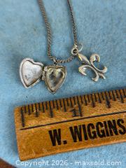 MaxSold Auction: Vintage Sterling Silver Ornate Heart Locket + 'Fleur Des Lis' Pendant Necklace - Hamilton (Ontario, Canada) SELLER MANAGED Estate Sale Online Auction - Gertrude Street