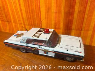 MaxSold Auction: Vintage Taiyo Japan Battery Operated Tin Police Car Toy - Hamilton (Ontario, Canada) SELLER MANAGED Estate Sale Online Auction - Gertrude Street