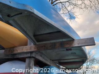 MaxSold Auction: Blue Fiberglass 3-Person Canoe - Newboro (Ontario, Canada) SELLER MANAGED Downsizing Online Auction - New Street