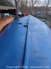 MaxSold Auction: Blue Fiberglass 3-Person Canoe - Newboro (Ontario, Canada) SELLER MANAGED Downsizing Online Auction - New Street