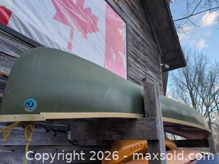 MaxSold Auction: Green Fiberglass Tandem Open Recreational Canoe (2 Person) - Newboro (Ontario, Canada) SELLER MANAGED Downsizing Online Auction - New Street