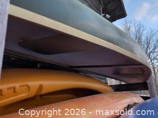 MaxSold Auction: Green Fiberglass Tandem Open Recreational Canoe (2 Person) - Newboro (Ontario, Canada) SELLER MANAGED Downsizing Online Auction - New Street