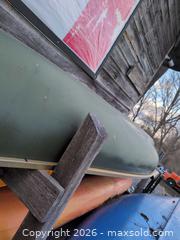 MaxSold Auction: Green Fiberglass Tandem Open Recreational Canoe (2 Person) - Newboro (Ontario, Canada) SELLER MANAGED Downsizing Online Auction - New Street