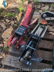 MaxSold Auction: Pair of Rolling Floor Jacks, 1.5–2 Ton Capacity, Red/Black - Newboro (Ontario, Canada) SELLER MANAGED Downsizing Online Auction - New Street
