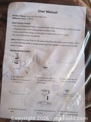 MaxSold Auction: Solar-Powered Terracotta/Brown Plastic & Metal Bird Bath - Newboro (Ontario, Canada) SELLER MANAGED Downsizing Online Auction - New Street