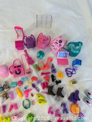MaxSold Auction: Barbie Dolls, Barbie House, Clothing & Accessories Collection - Ottawa (Ontario, Canada) SELLER MANAGED Moving Online Auction -  Sablewood Place