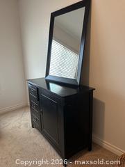 MaxSold Auction: Black Storage Cabinet with Mirror - Ottawa (Ontario, Canada) SELLER MANAGED Moving Online Auction -  Sablewood Place