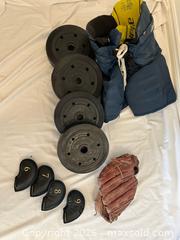 MaxSold Auction: Sports Equipment Lot with Weight Plates, Hockey Gear & Baseball Glove - Ottawa (Ontario, Canada) SELLER MANAGED Moving Online Auction -  Sablewood Place