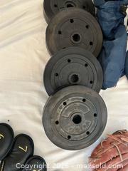 MaxSold Auction: Sports Equipment Lot with Weight Plates, Hockey Gear & Baseball Glove - Ottawa (Ontario, Canada) SELLER MANAGED Moving Online Auction -  Sablewood Place