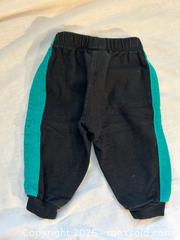 MaxSold Auction: Vintage Baby Jogger Pants – Size 3–6 Months – Black with Green Stripe - Ottawa (Ontario, Canada) SELLER MANAGED Moving Online Auction -  Sablewood Place