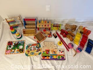 MaxSold Auction: Wooden Educational Toys & Puzzles – Activity Toys, Blocks, Vehicles & Musical Instruments - Ottawa (Ontario, Canada) SELLER MANAGED Moving Online Auction -  Sablewood Place