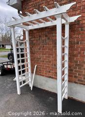 MaxSold Auction: White Vinyl Garden Arbor, Approx. 7' H x 4' W - South Stormont (Ontario, Canada) SELLER MANAGED Downsizing Online Auction - Street Lawrence Street