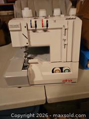 MaxSold Auction: Serger Sewing Machine and thread spools - Kawartha Lakes (Ontario, Canada) SELLER MANAGED Estate Sale Online Auction - Mary Street West