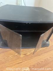 MaxSold Auction: Black TV Stand with Smoked Glass Doors, 32 in W - Las Vegas (Nevada, USA) PARTNER MANAGED Estate Sale Online Auction - Masked Duck Avenue