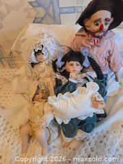 MaxSold Auction: Lot of 4 Porcelain/Bisque Collectible Dolls — Clown & Baby - Calgary (Alberta, Canada) PARTNER MANAGED Downsizing Online Auction - Huntcroft Way Northeast