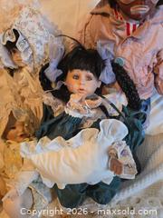 MaxSold Auction: Lot of 4 Porcelain/Bisque Collectible Dolls — Clown & Baby - Calgary (Alberta, Canada) PARTNER MANAGED Downsizing Online Auction - Huntcroft Way Northeast