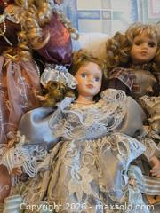 MaxSold Auction: Lot of 4 Porcelain/Bisque Collector Dolls, 12–24 in - Calgary (Alberta, Canada) PARTNER MANAGED Downsizing Online Auction - Huntcroft Way Northeast
