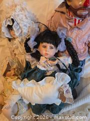 MaxSold Auction: Mixed Lot of 4 Collector Porcelain, Ceramic and Vinyl Dolls - Calgary (Alberta, Canada) PARTNER MANAGED Downsizing Online Auction - Huntcroft Way Northeast