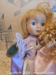 MaxSold Auction: Set of 4 Porcelain & Cloth Collectible Dolls, 12–18 in - Calgary (Alberta, Canada) PARTNER MANAGED Downsizing Online Auction - Huntcroft Way Northeast