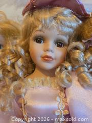 MaxSold Auction: Set of 4 Porcelain & Cloth Collectible Dolls, 12–18 in - Calgary (Alberta, Canada) PARTNER MANAGED Downsizing Online Auction - Huntcroft Way Northeast