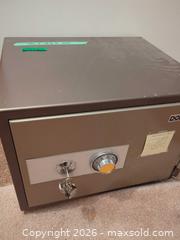 MaxSold Auction: Gray Steel Safe / Security - Central Saanich (British Columbia, Canada) PARTNER MANAGED Moving Online Auction - Cultra Avenue