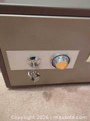 MaxSold Auction: Gray Steel Safe / Security - Central Saanich (British Columbia, Canada) PARTNER MANAGED Moving Online Auction - Cultra Avenue
