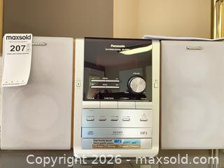 MaxSold Auction: Panasonic Silver CD Stereo System (MP3 Compatible) - Central Saanich (British Columbia, Canada) PARTNER MANAGED Moving Online Auction - Cultra Avenue