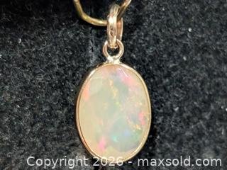 MaxSold Auction: 10K(0.57g)Opal(1.8ct) Pendant  - Toronto (Ontario, Canada) PARTNER MANAGED Downsizing Online Auction - Yonge Street
