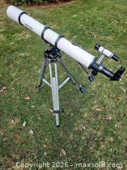 MaxSold Auction: Meade Model 390 Refractor Telescope – 90mm – 1000mm f/11 – With Tripod - Toronto (Ontario, Canada) SELLER MANAGED Downsizing Online Auction - Valecrest Drive
