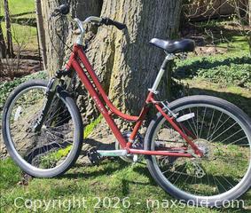 MaxSold Auction: Raleigh Venture Hybrid/Commuter Bike – Red Aluminum Frame – Working - Toronto (Ontario, Canada) SELLER MANAGED Downsizing Online Auction - Valecrest Drive