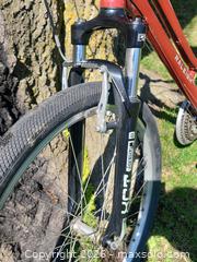 MaxSold Auction: Raleigh Venture Hybrid/Commuter Bike – Red Aluminum Frame – Working - Toronto (Ontario, Canada) SELLER MANAGED Downsizing Online Auction - Valecrest Drive